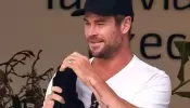 Chris Hemsworth Shows Off His New Abstract Arm Tattoo in Sydney — See the Photos